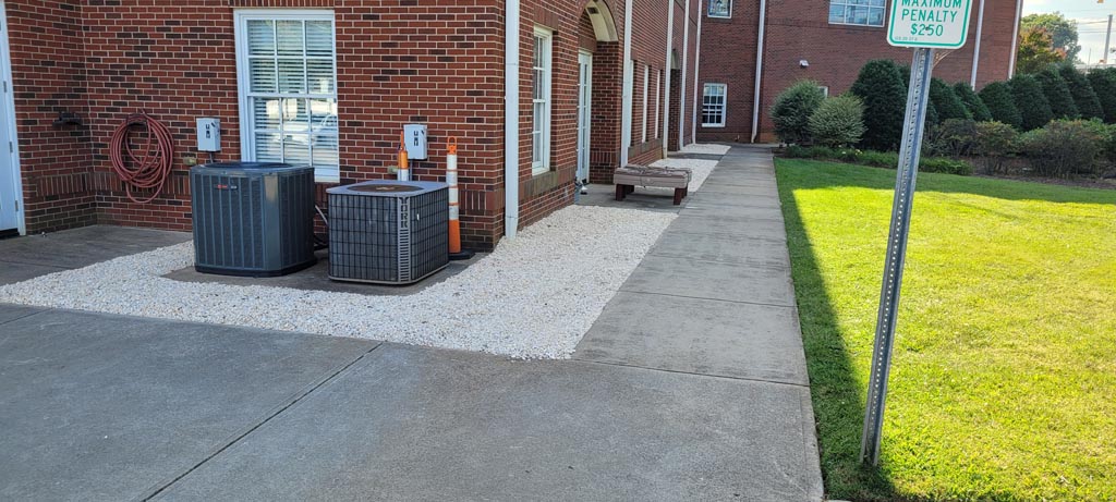 Brand new decorative rock placed beautifully around a city building.