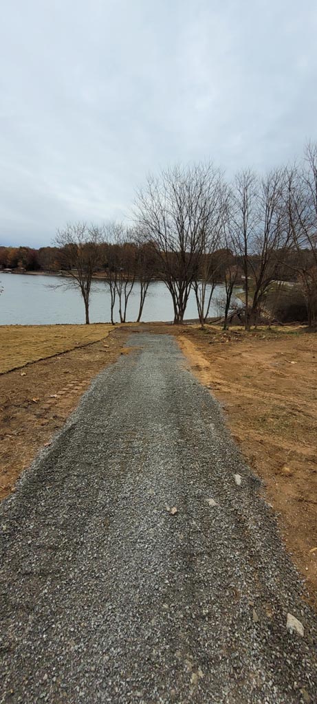 A newly installed gravel road heading out to the lake.