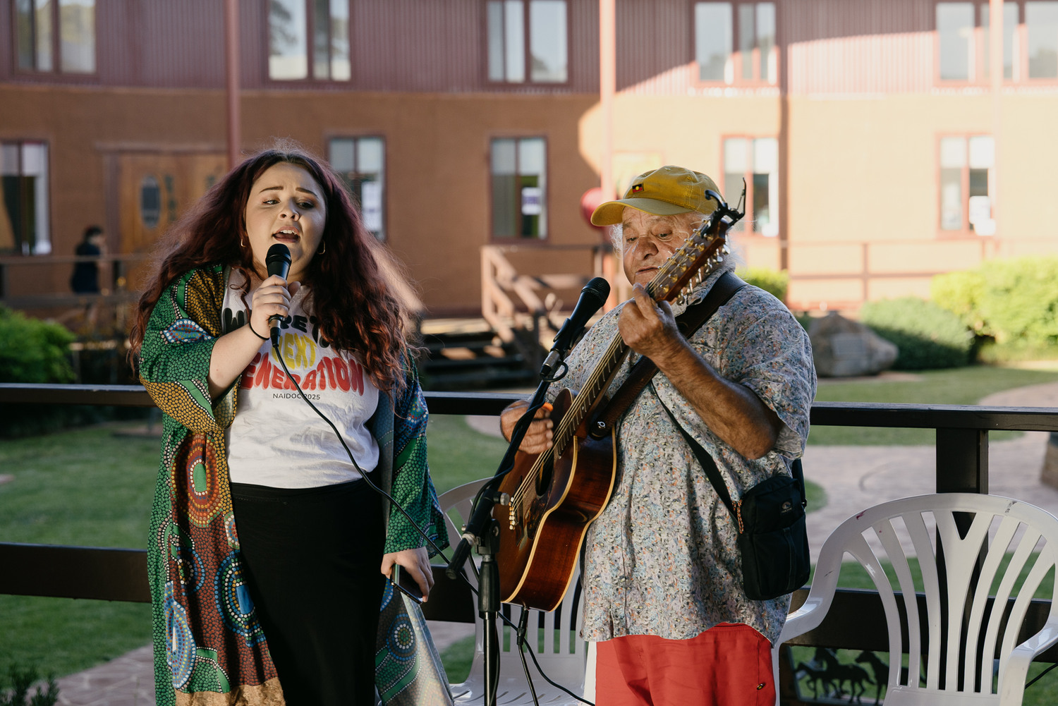 Johnny Huckle and his daughter Dindima play music at Family Day at Wiradjuri Condobolin Corporation. Johnny shares his story in the book project. Photo credit: Jacinta Keefe