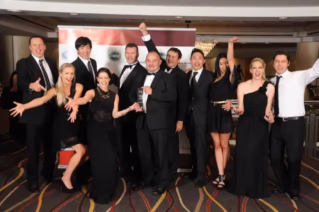 The BurgerFuel crew celebrating with Charles Haddrell from New Zealand Trade and Enterprise.