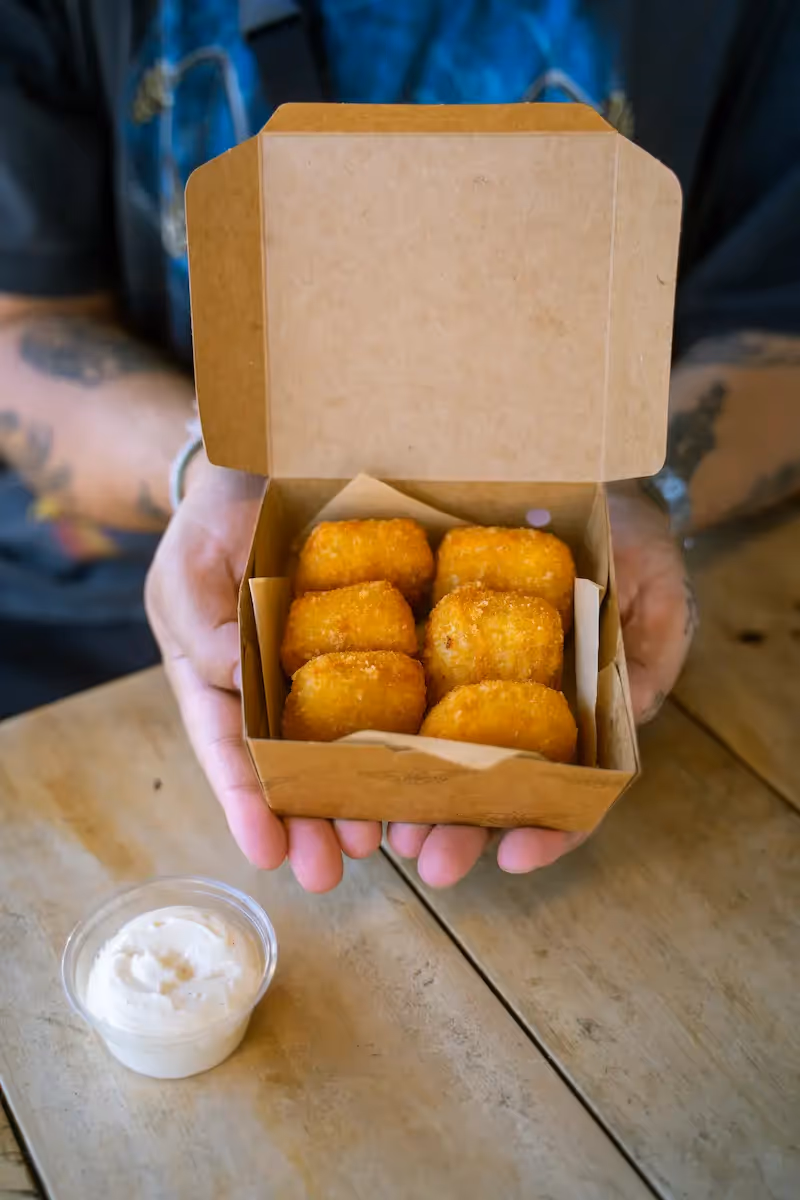 Smack & Cheese Bites: crunchy mac & cheese with bacon and chives, served with BurgerFuel Aioli. Six bites of addictive, cheesy goodness