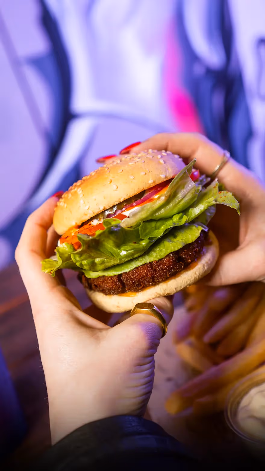 The Ranch Wrangler: a crispy, chicken-free plant-based burger with vegan Buffalo and Ranch sauces, pickles, fresh salad, and Vegan Aioli. No meat, all flavour.