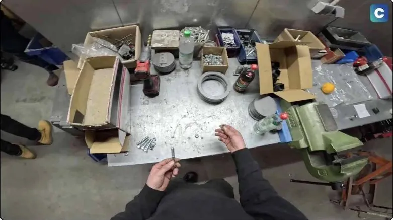 POV recording of an assembly at a workbench in Clypp