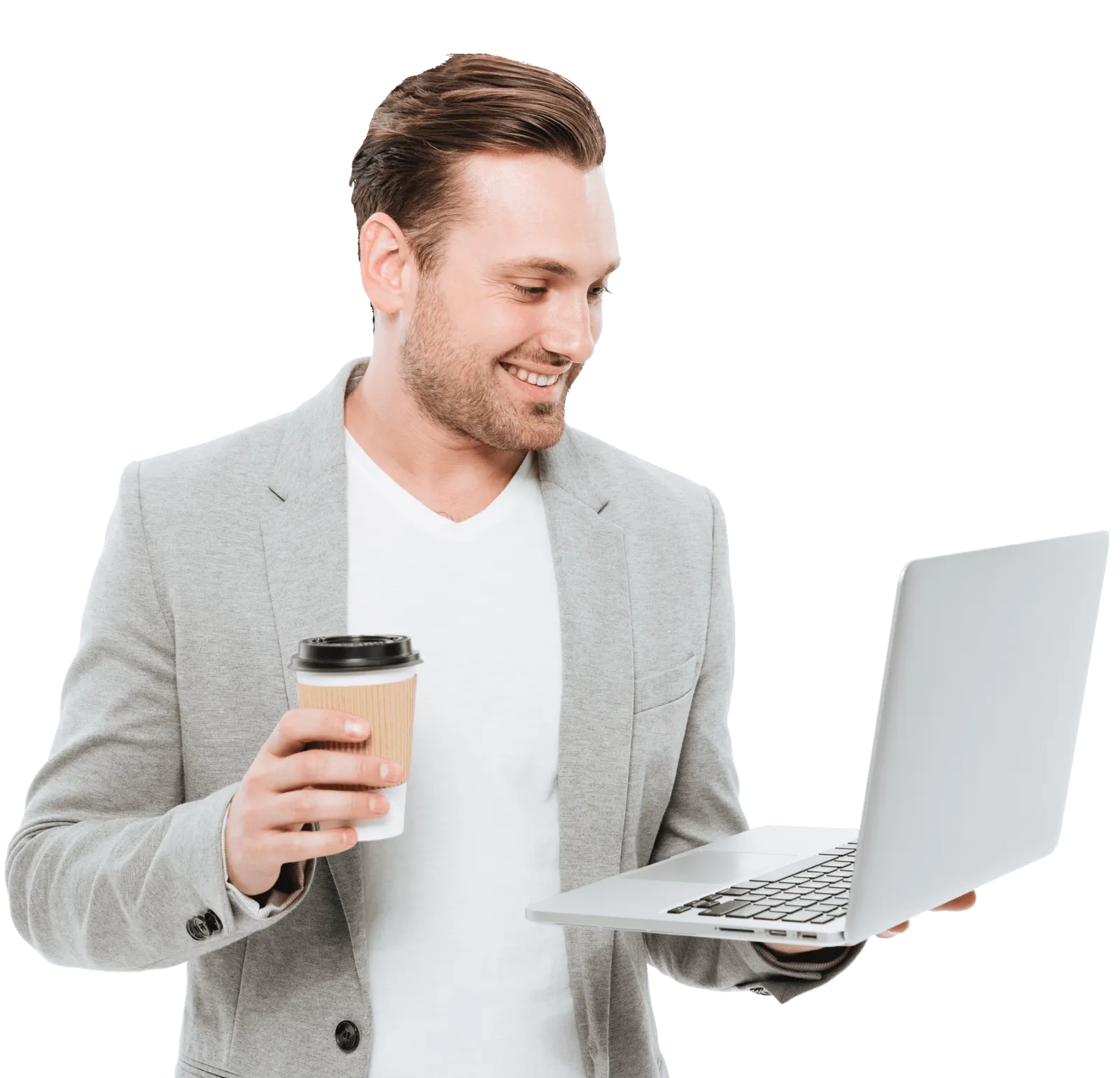 cheerful young businessman drinking coffee using laptop