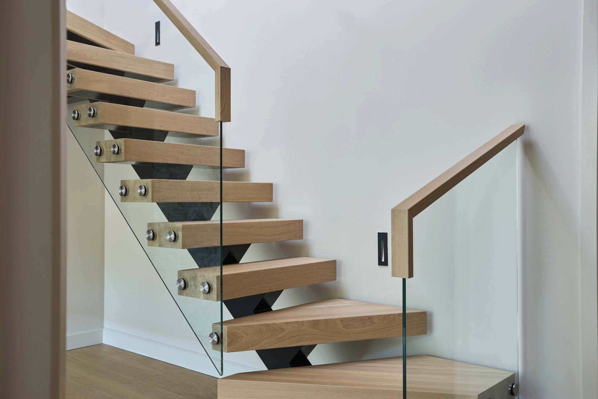 This is one of our most popular styles, defined by its central spine structure. An exceptional example of architectural steelwork, we fabricate it from scratch, free of visible welds and crafted with total precision.