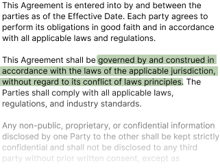 A clause with the changed governing law language highlighted against the prior version