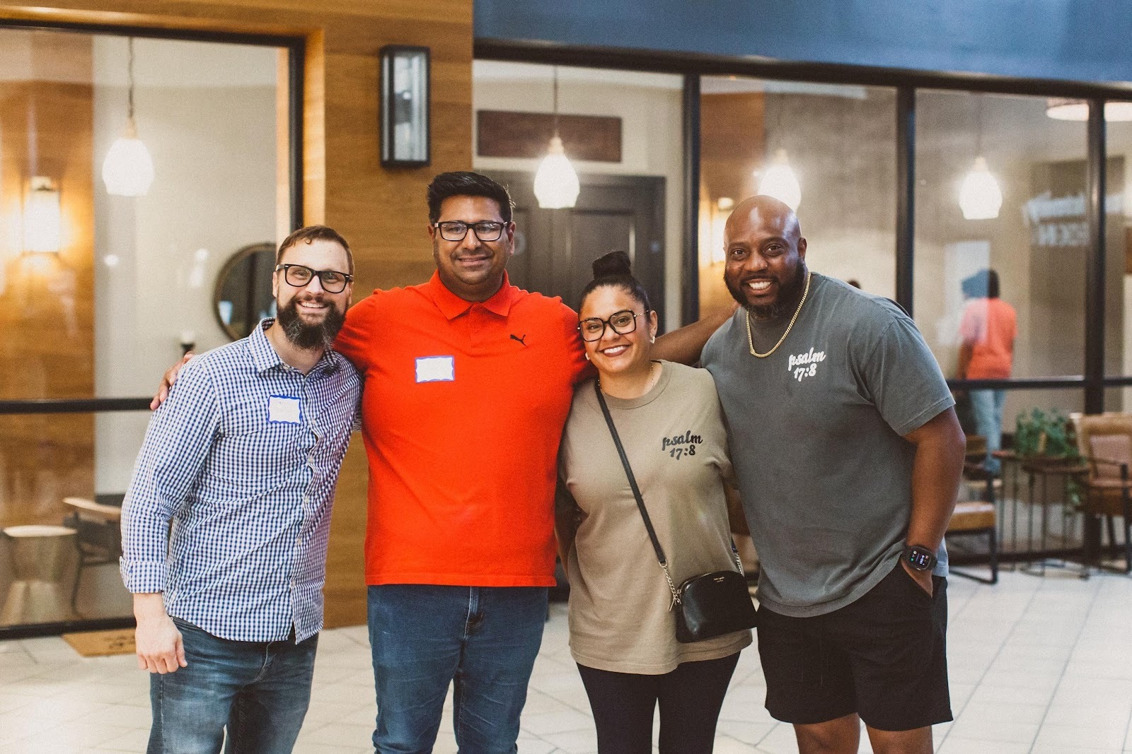 A group of people posing for a photoAI-generated content may be incorrect.