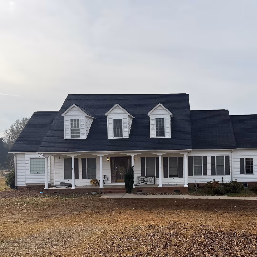 new roof on white home in anderson sc