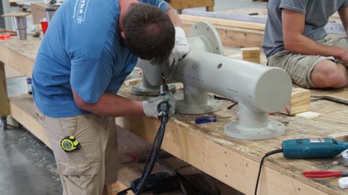 Man plastic welding a pipe