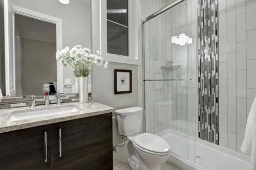 Nice bathroom with cat artwork
