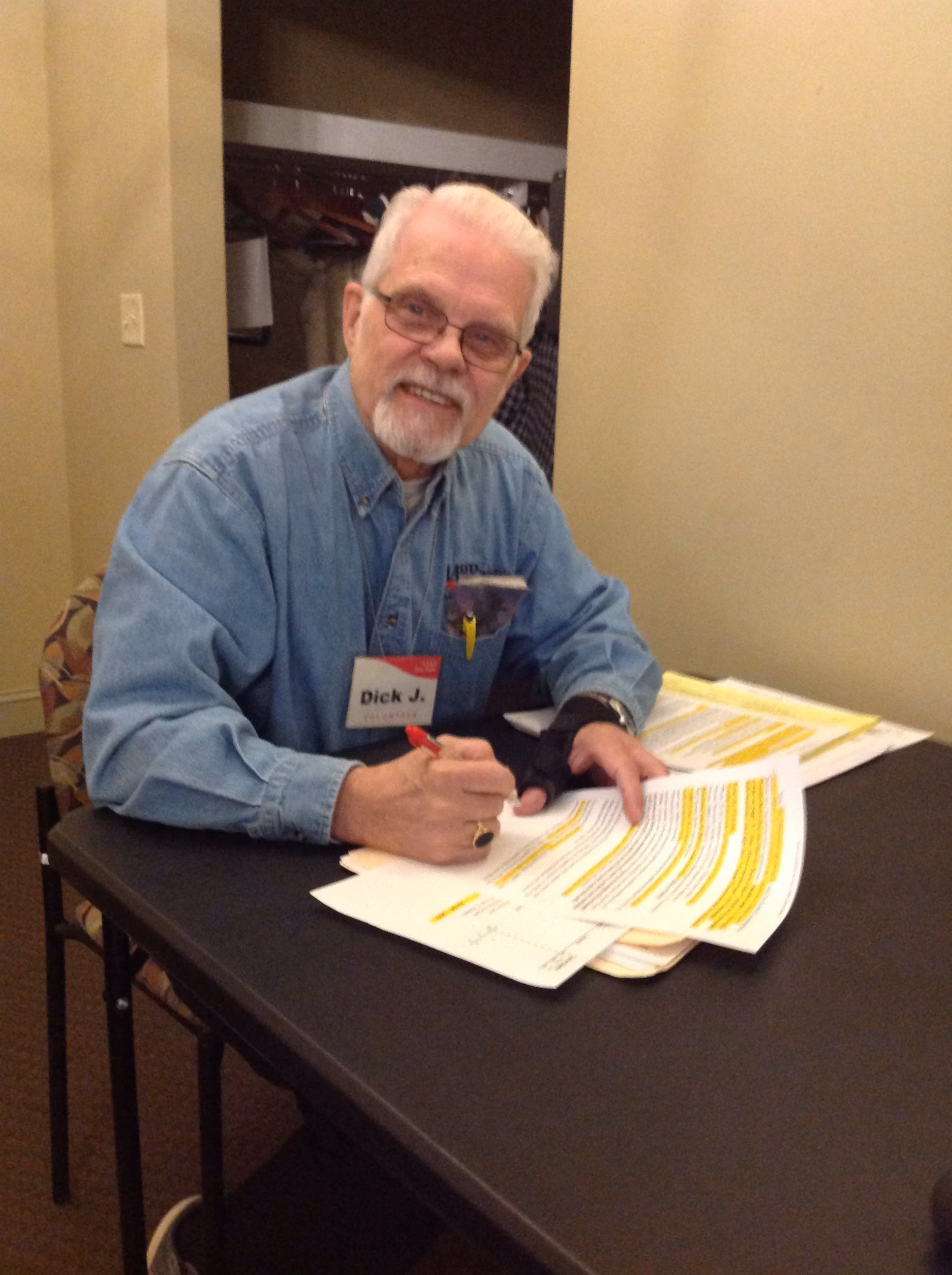 Dick Jedwill completing practice tax returns