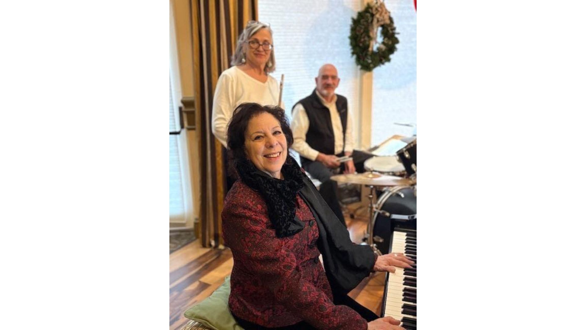 Three performers at the Ardenwoods Singers holiday performance