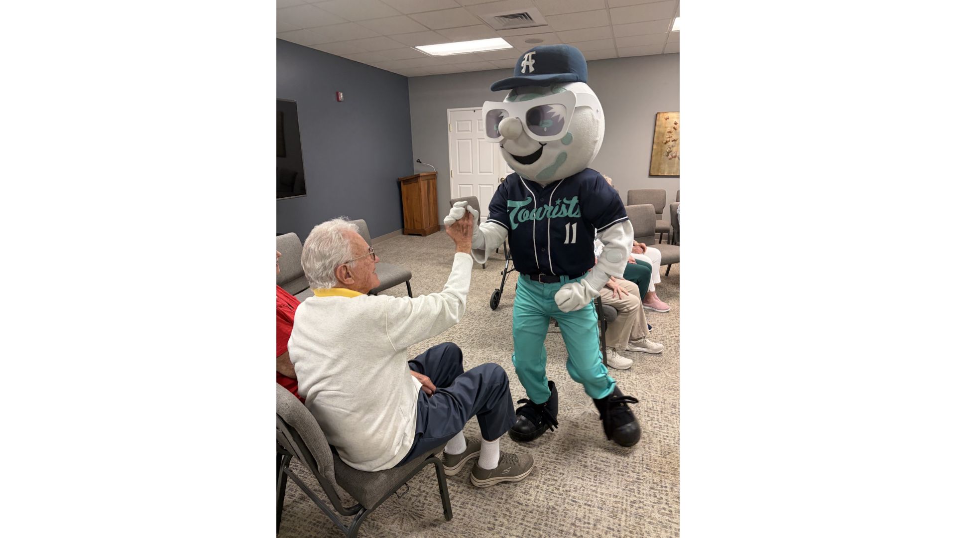 An Ardenwoods and Asheville Tourists mascot Mr. Moon