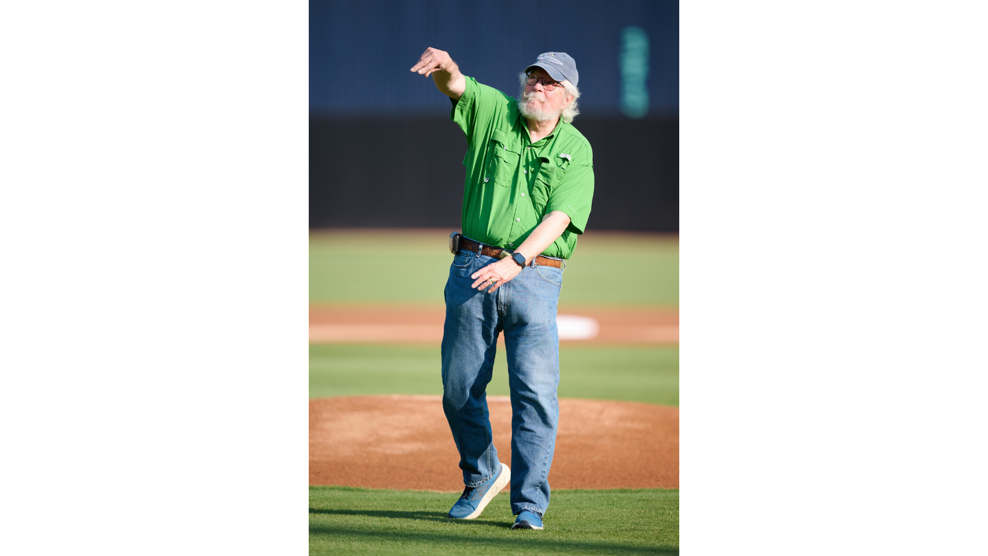 Ardenwoods resident David Zimmerman throws the first pitch at the Asheville Tourists baseball game.