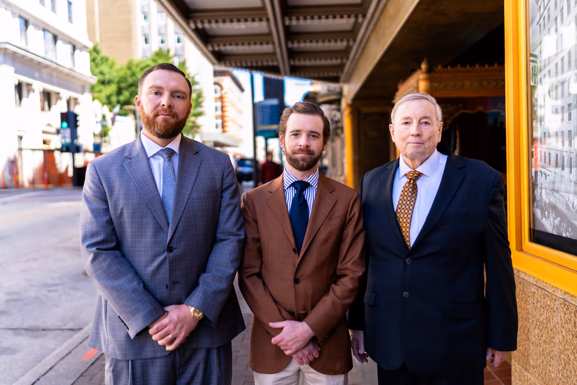 Knoxville trusted legal team, Burks & Ogle, standing in downtown Knoxville. 