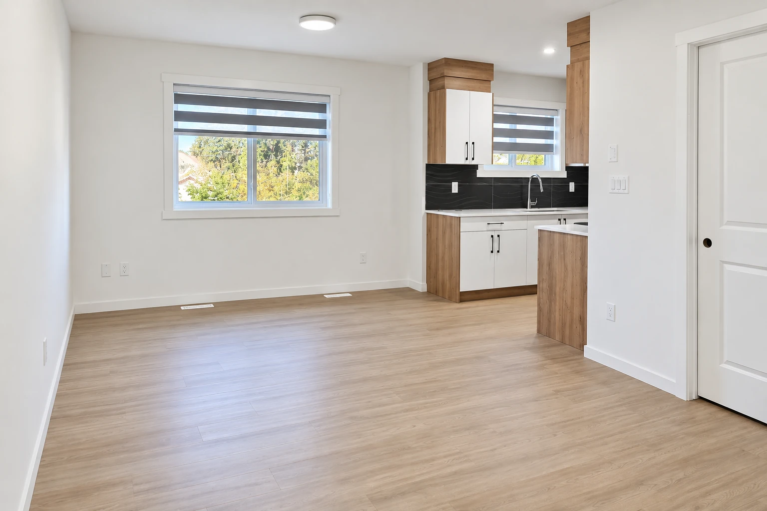 Garden Suite living area and kitchen at 10744 & 10746 155 Street NW