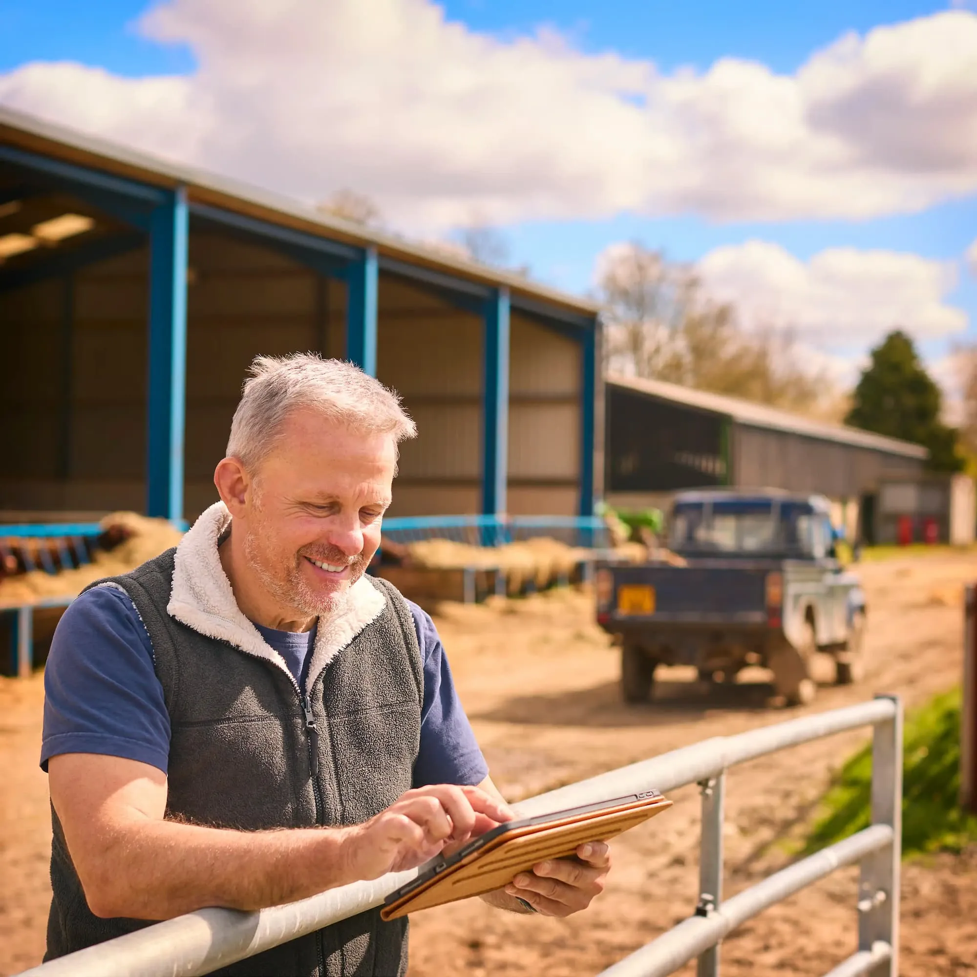 farmer updating documents on farm site