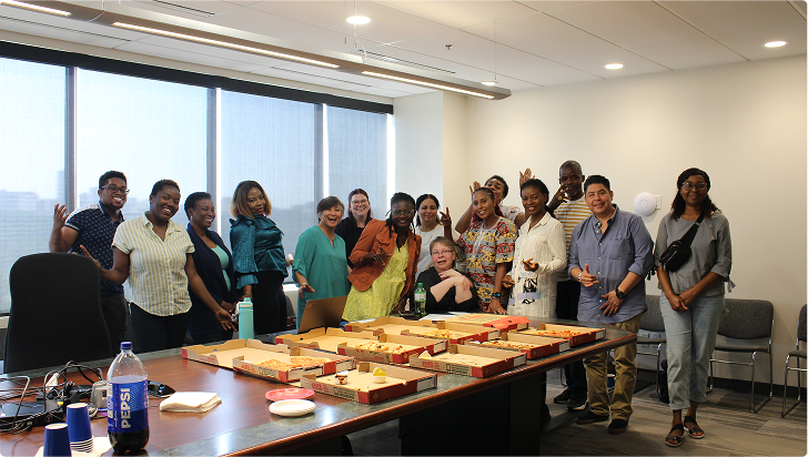 Excel Society team having a pizza party.