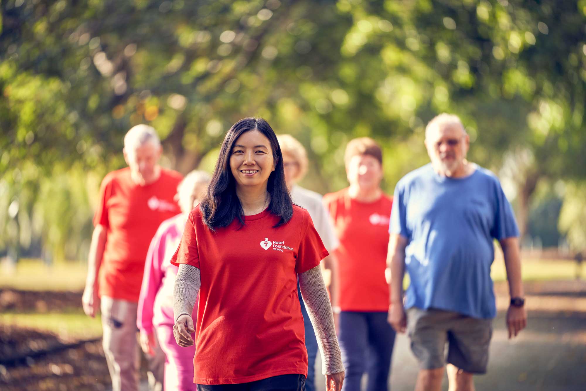 Heartfoundation Walking Volunteer In Red Tshirt Ahead Of Group Jpeg