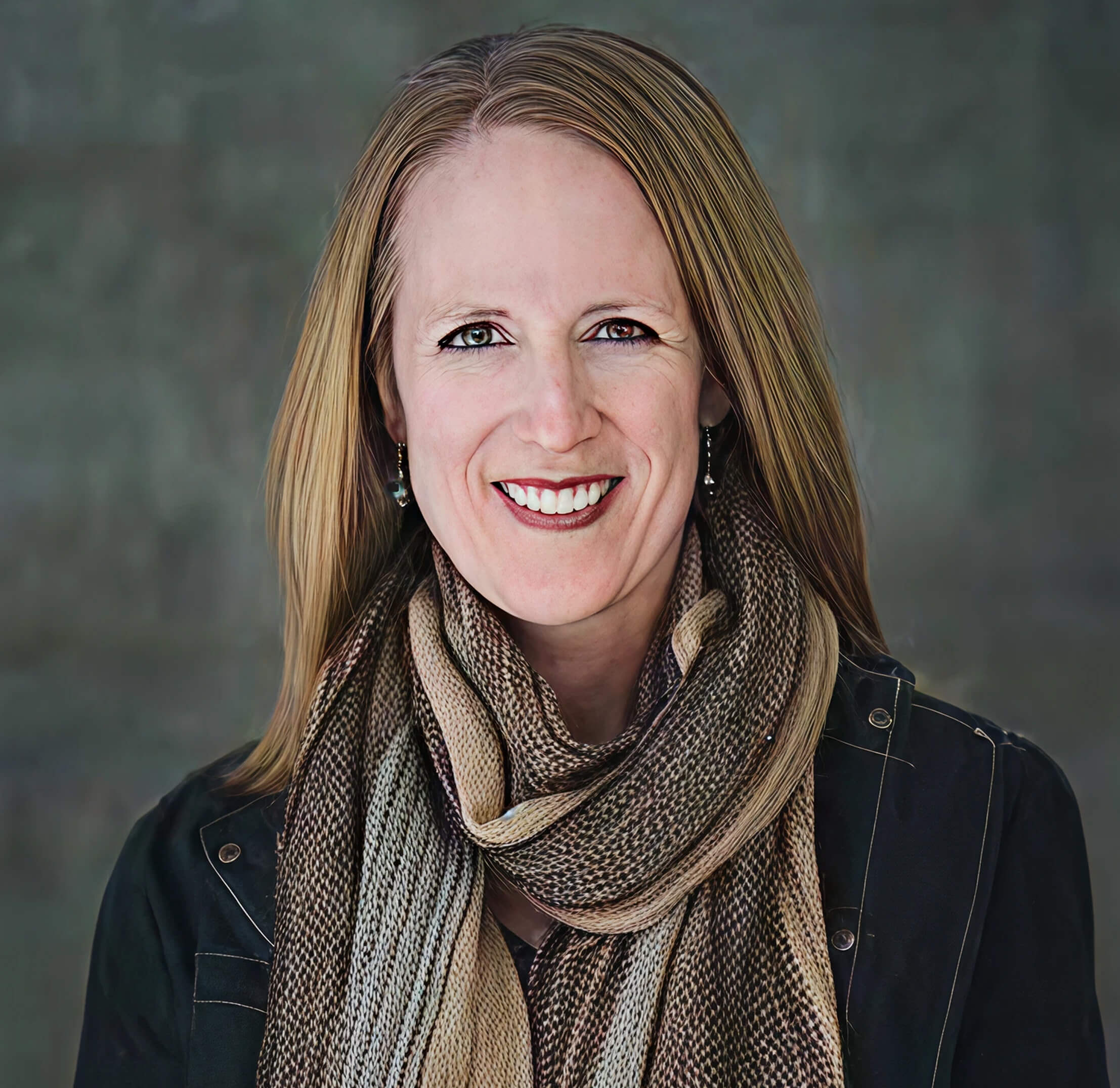 Woman smiling with scarf