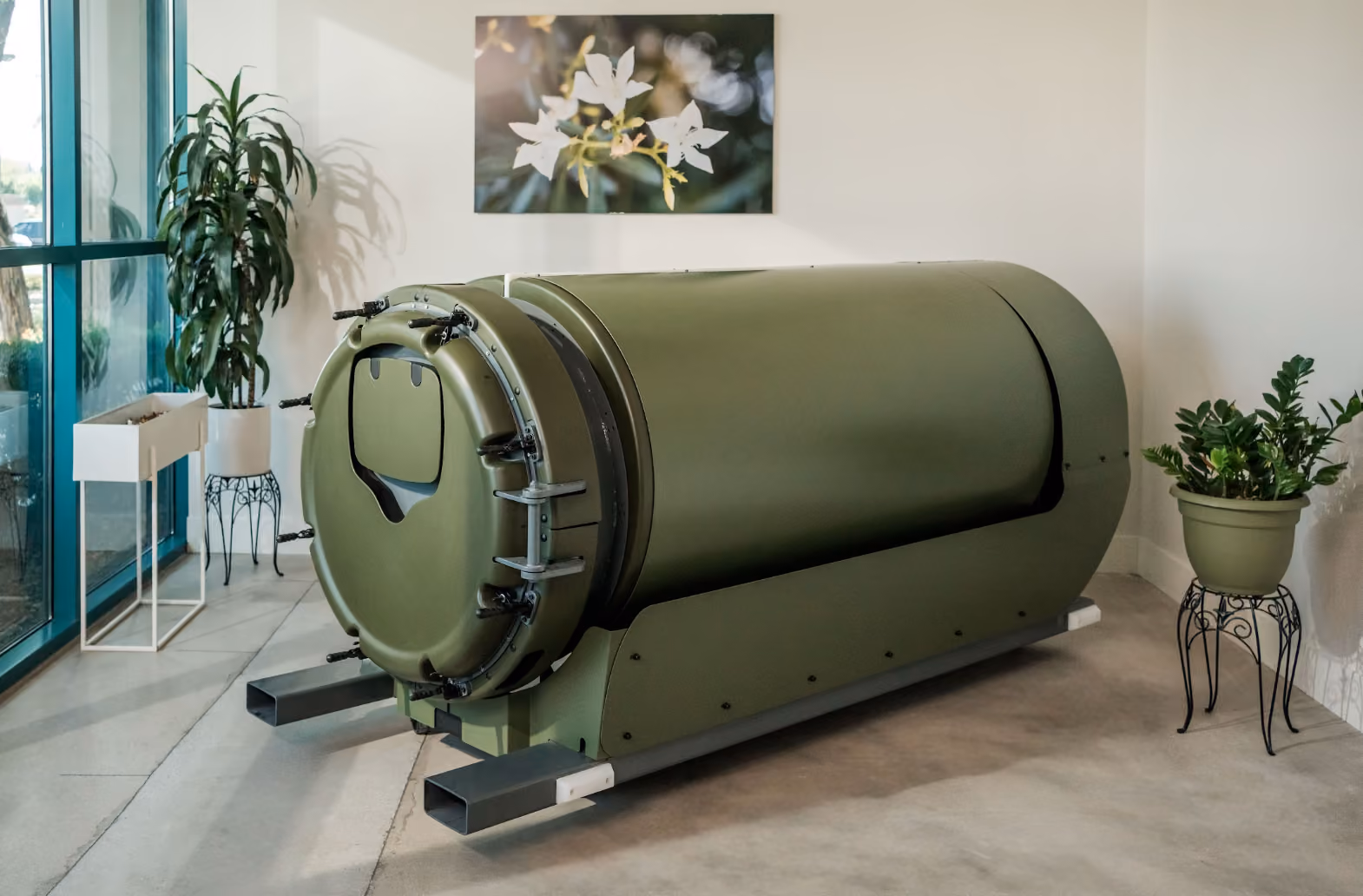 A modern, beautiful room containing vessels in Earth Funeral’s state-of-the-art human composting facility