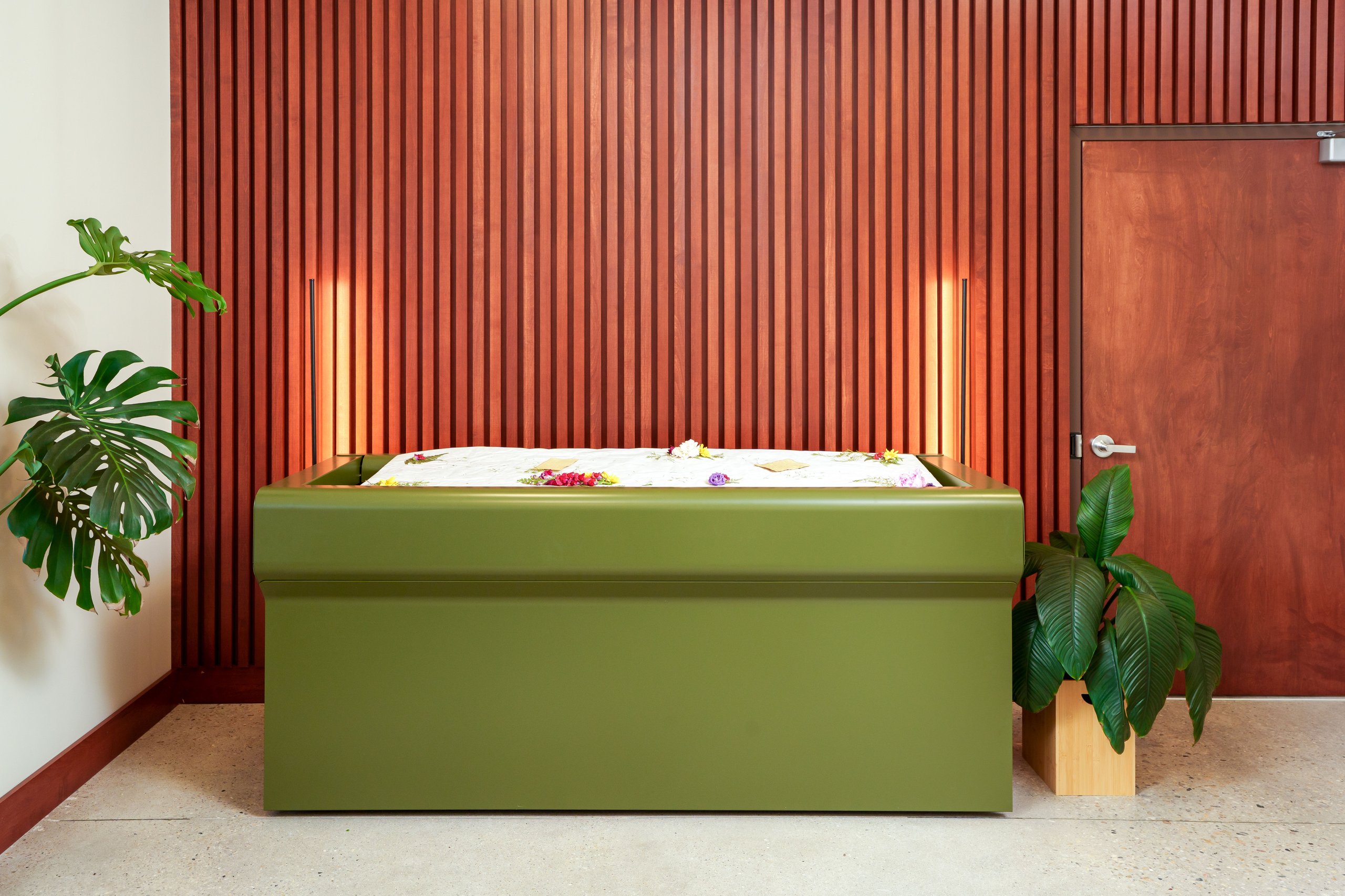 Where your loved one rests, surrounded by flowers and natural materials
