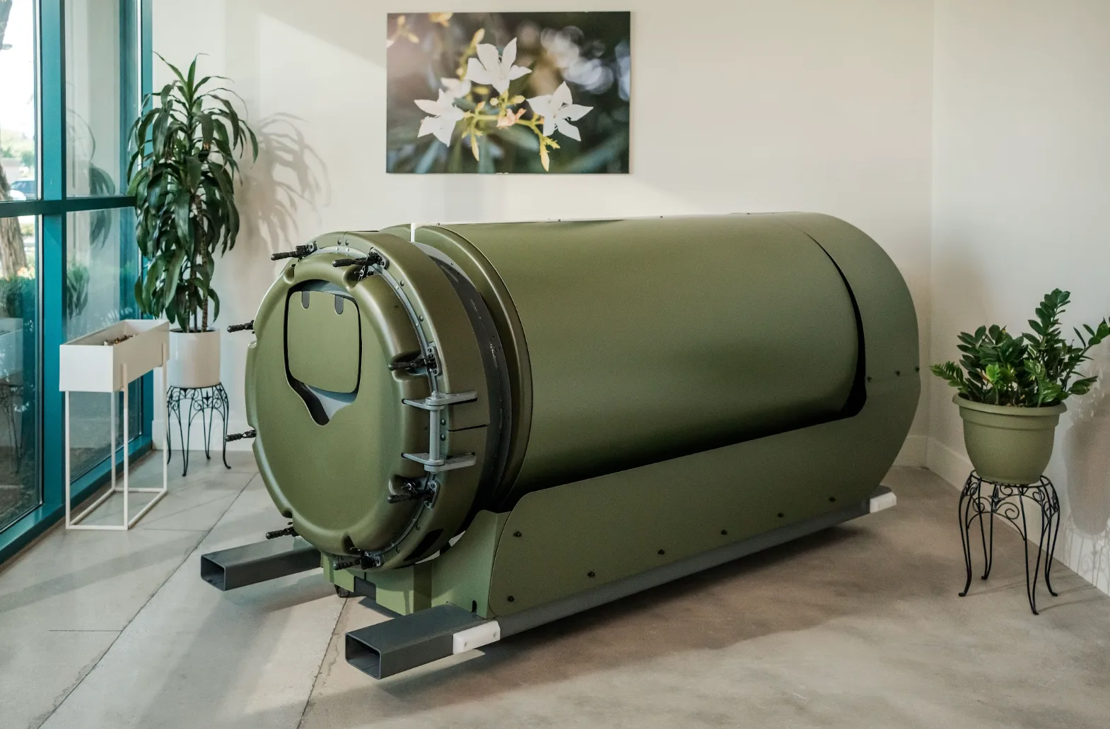 A modern, beautiful room containing vessels in Earth Funeral’s state-of-the-art human composting facility