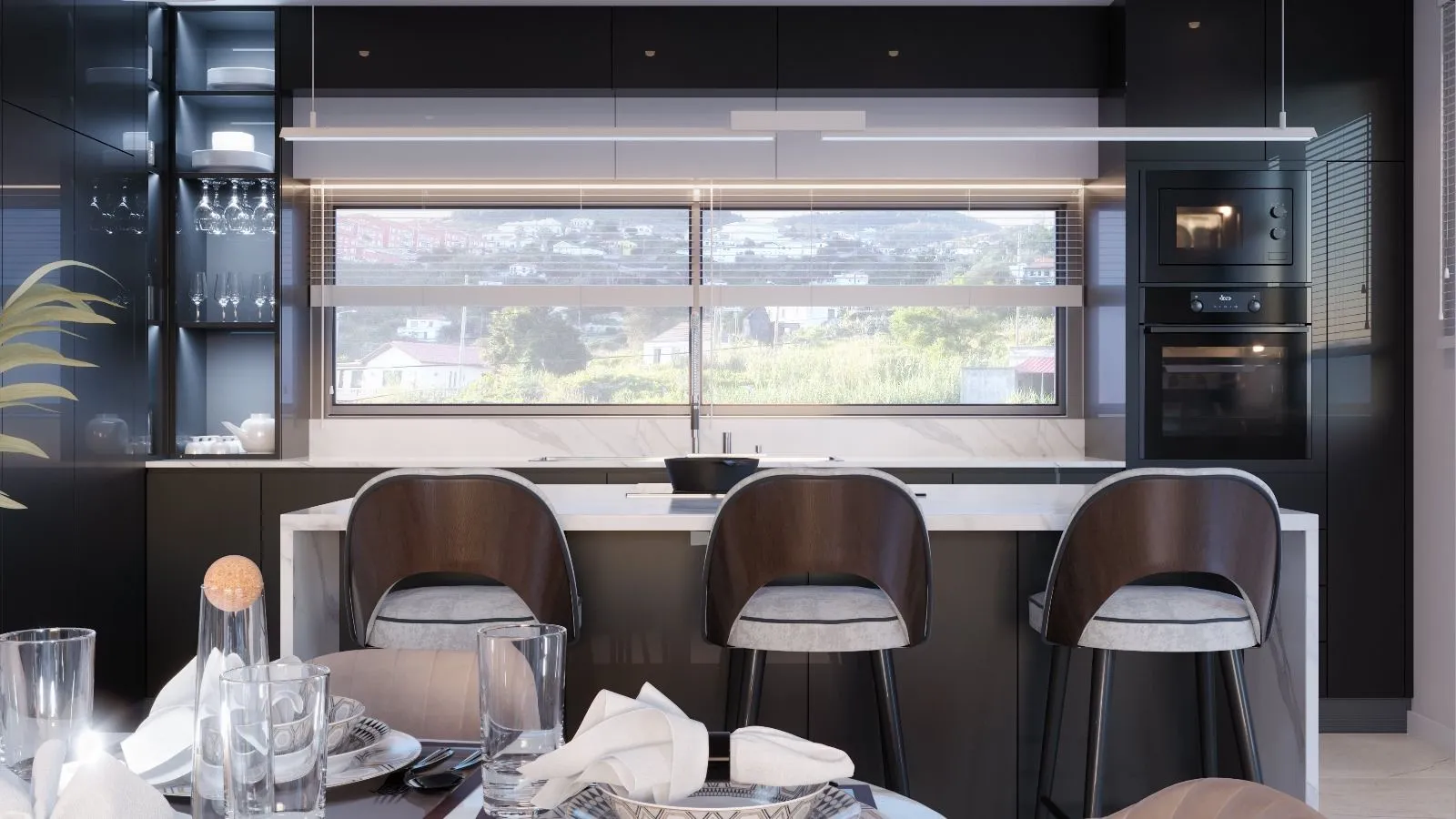 Open-plan kitchen integrated with the social areas of the Tendeira villa