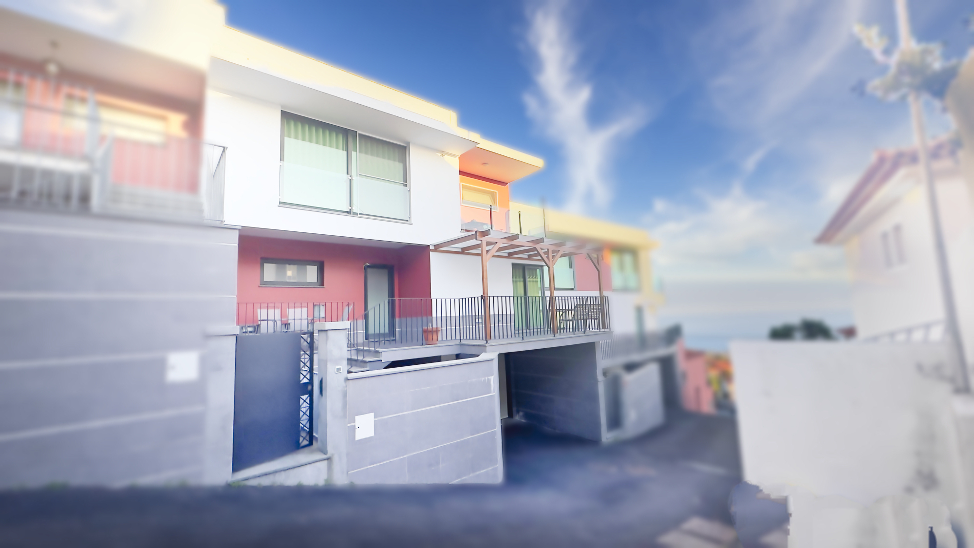 Exterior overview of the modern family home in a quiet Funchal neighbourhood