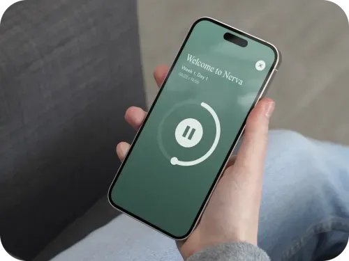 A person listening to gut-directed hypnotherapy in the Nerva app