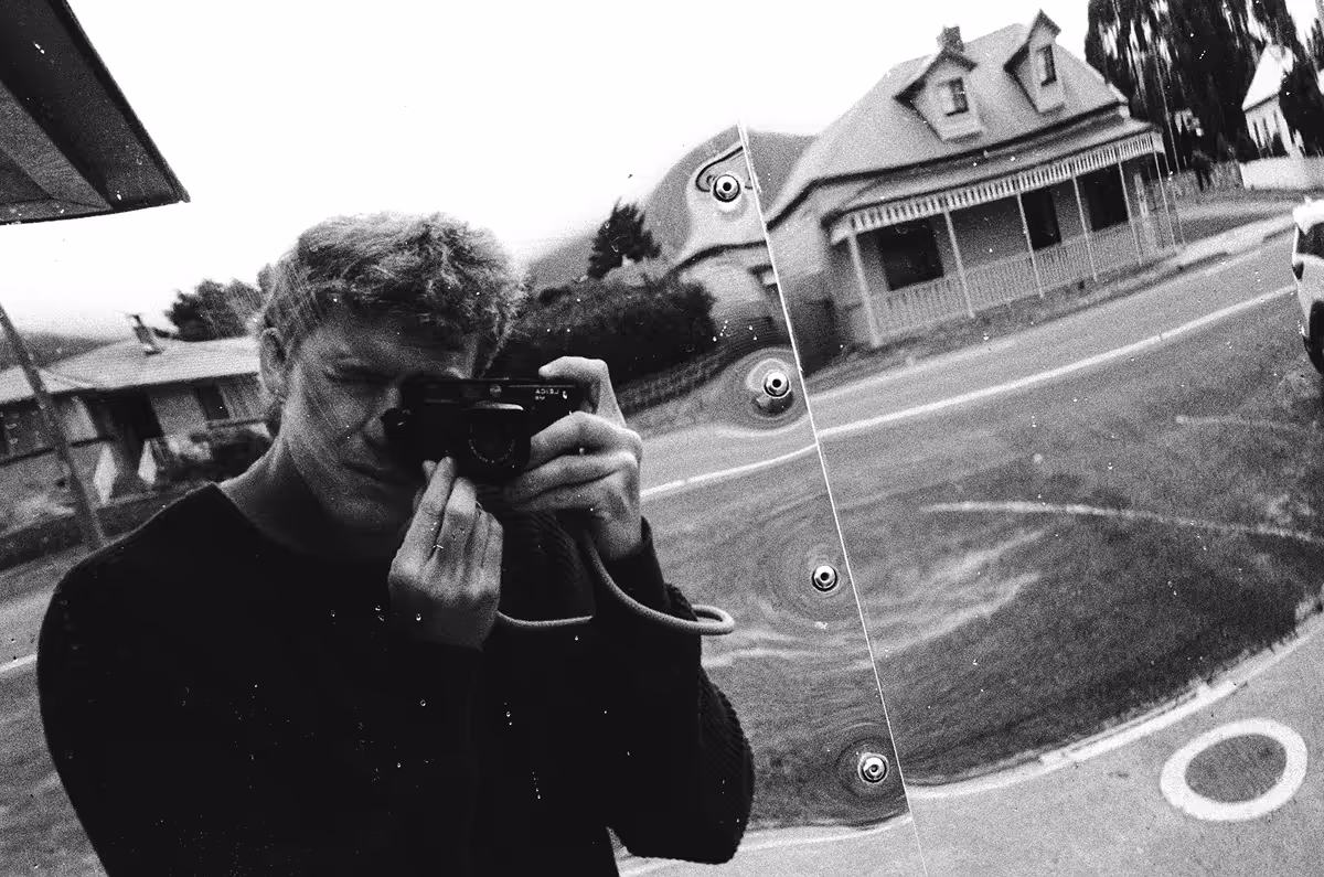 Kitale Wilson taking a picture of himself through a reflection