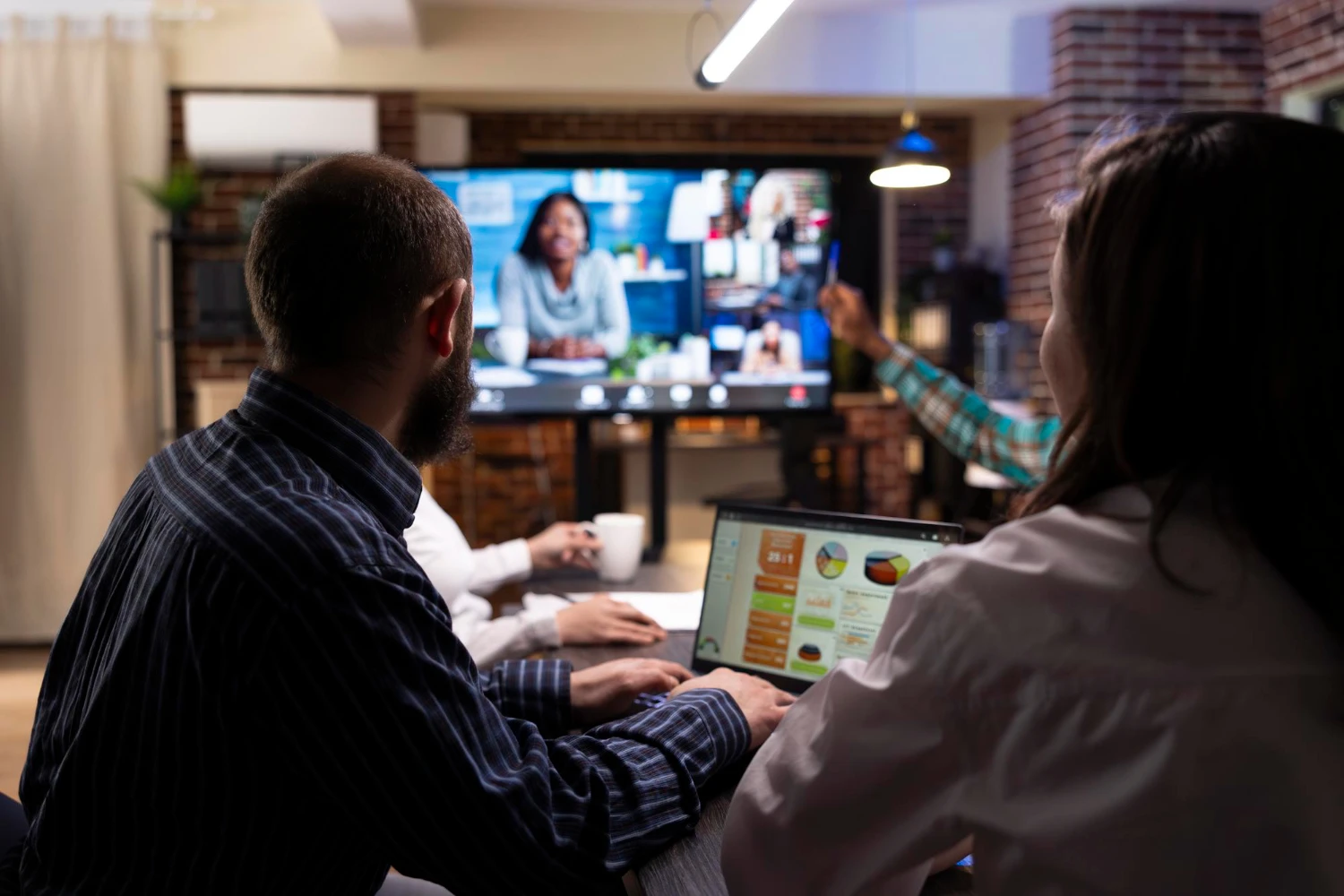 Team at Aitoleads monitoring live call center analytics dashboard
