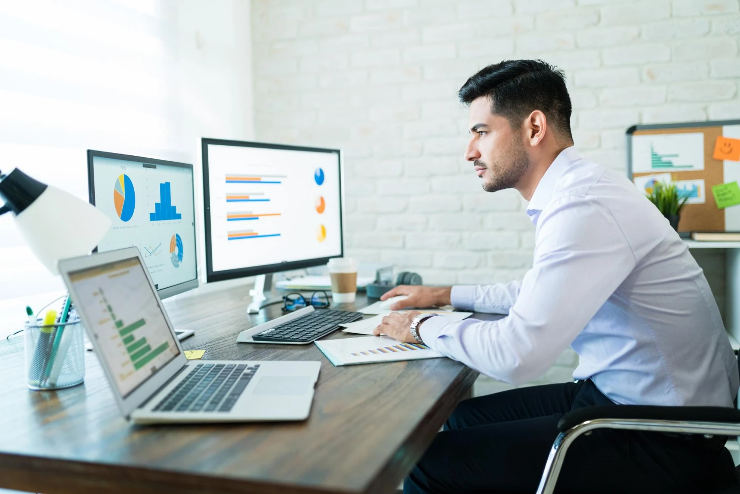 Business owner reviewing CRM dashboard with lead follow-up automation
