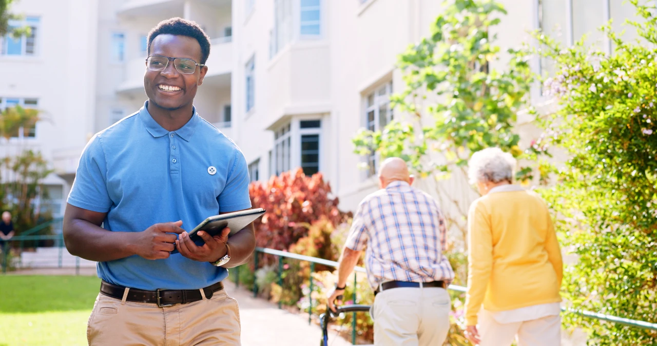 senior-care-nurse-and-tablet-with-man-outdoor