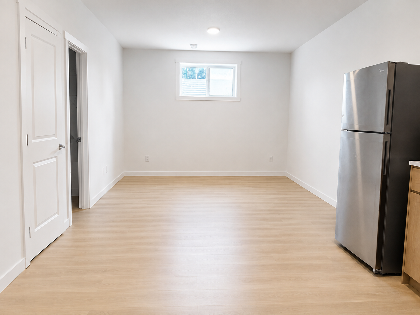 Basement-suite living area at 8016–159 Street NW