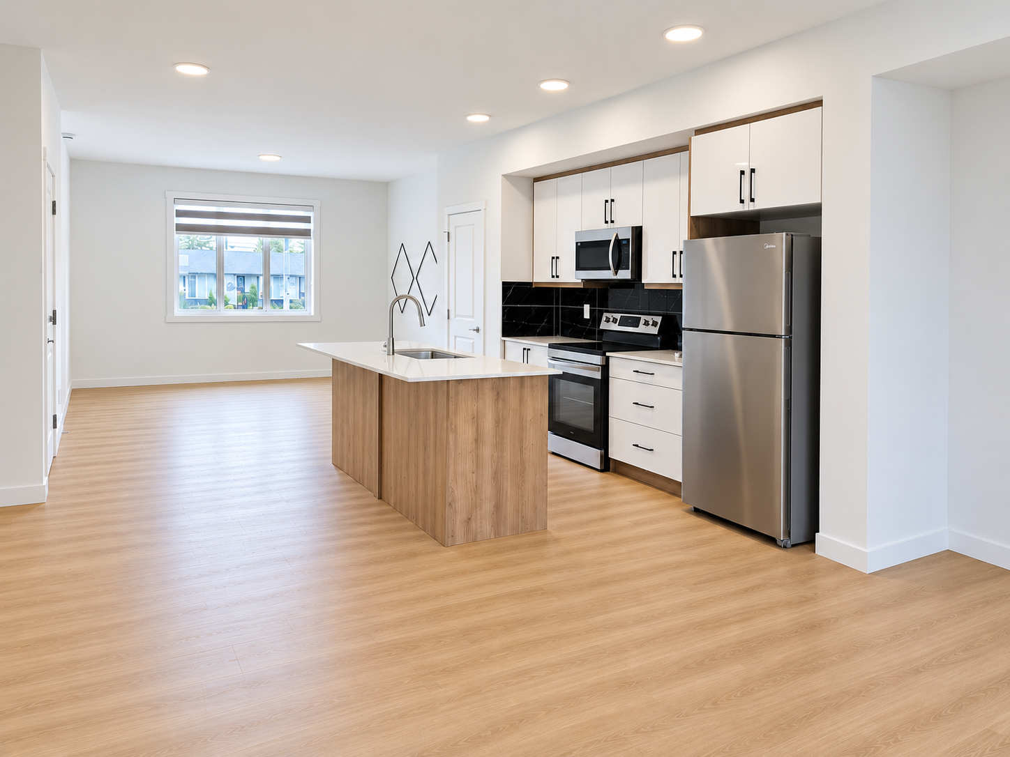 Kitchen and living area in the main house at 8016–159 Street NW