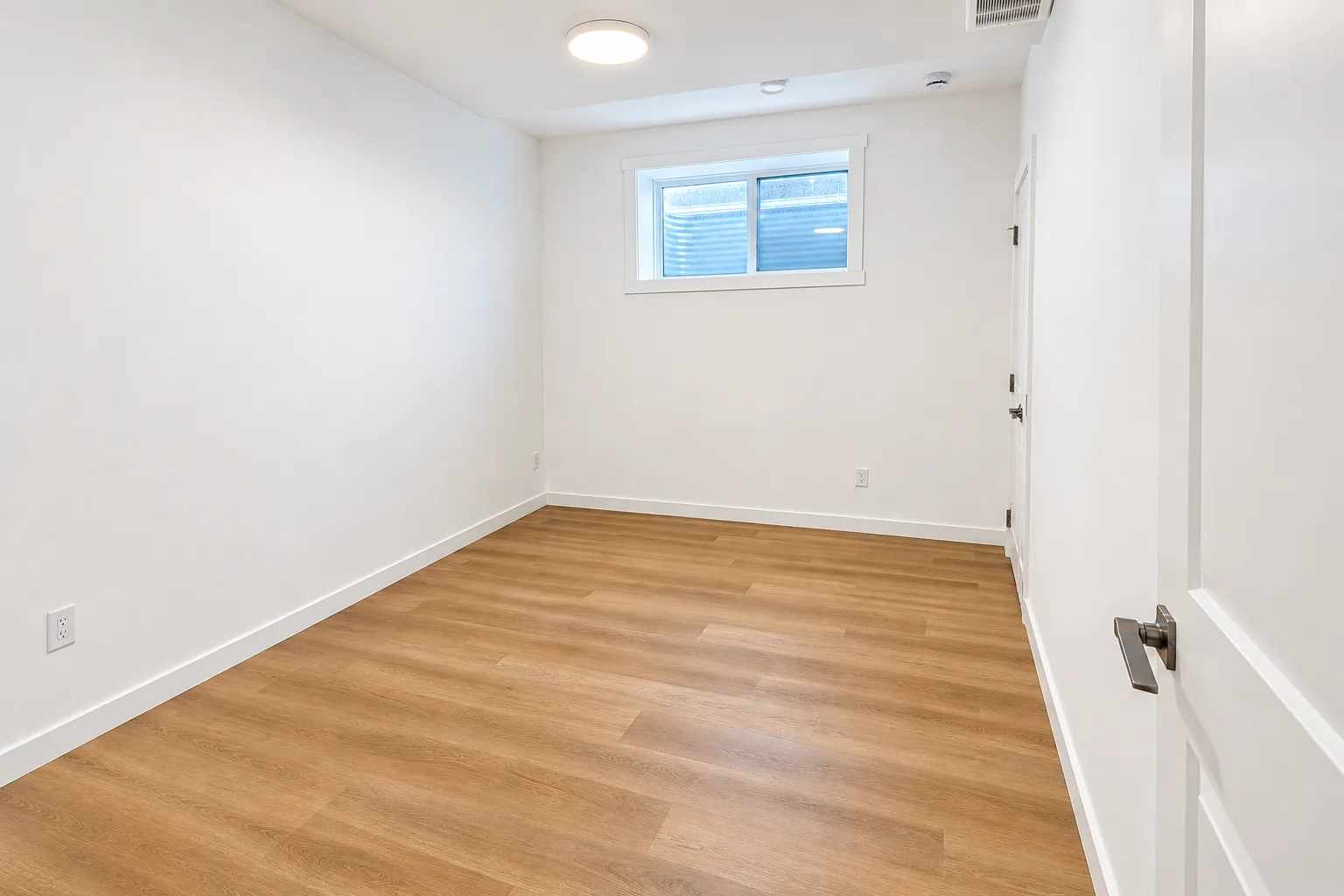Basement-suite bedroom at 8016–159 Street NW — Rendering: framing extended.