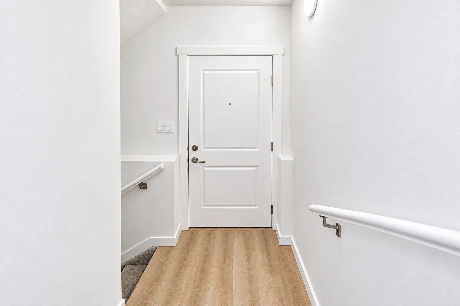 Basement-suite entry and staircase at 8016–159 Street NW — Rendering: framing extended.