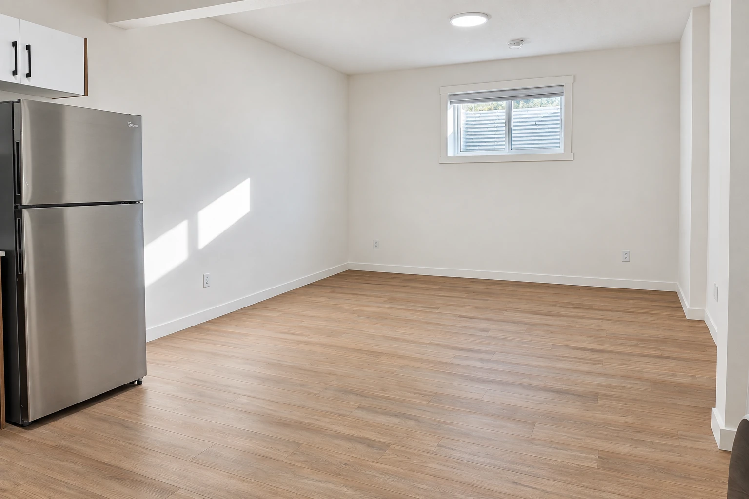 Basement suite living area at 10744 & 10746 155 Street NW