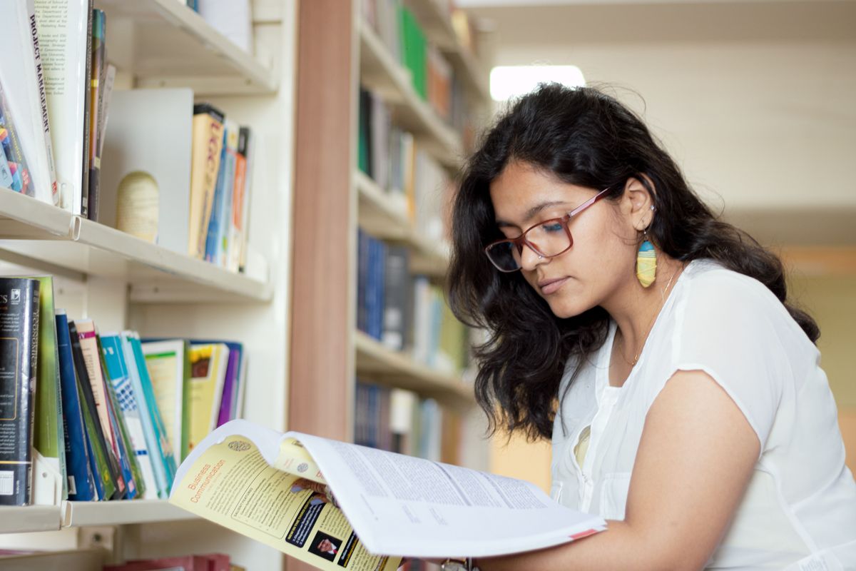 Student studying in a library