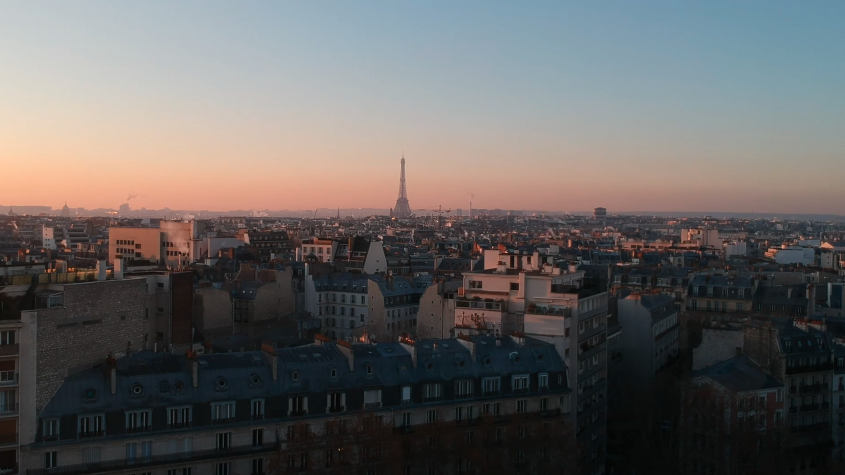 From rooftops to icons – a sweeping view of Paris at dawn that captures the essence of elevated, forward-thinking branding. A panoramic view of Paris with the Eiffel Tower at sunrise – symbolizing clarity, ambition, and global vision.