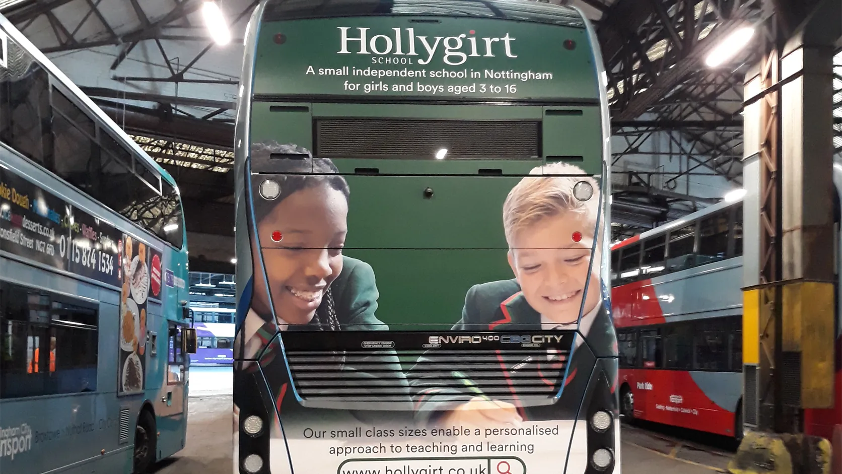 Hollygirt School advertising on the rear of a Nottingham City Transport bus