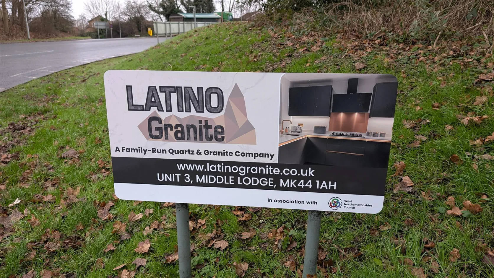 Latino Granite roundabout advertising sign in Northamptonshire