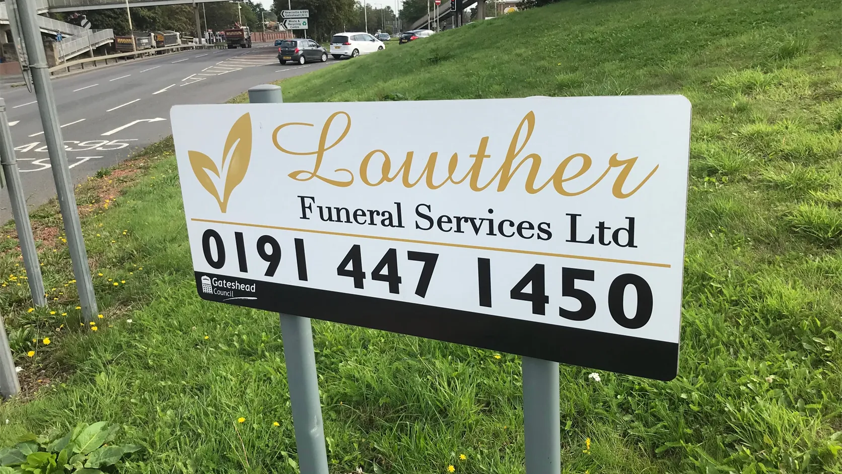Lowther Funeral Services roundabout advertising sign in Gateshead
