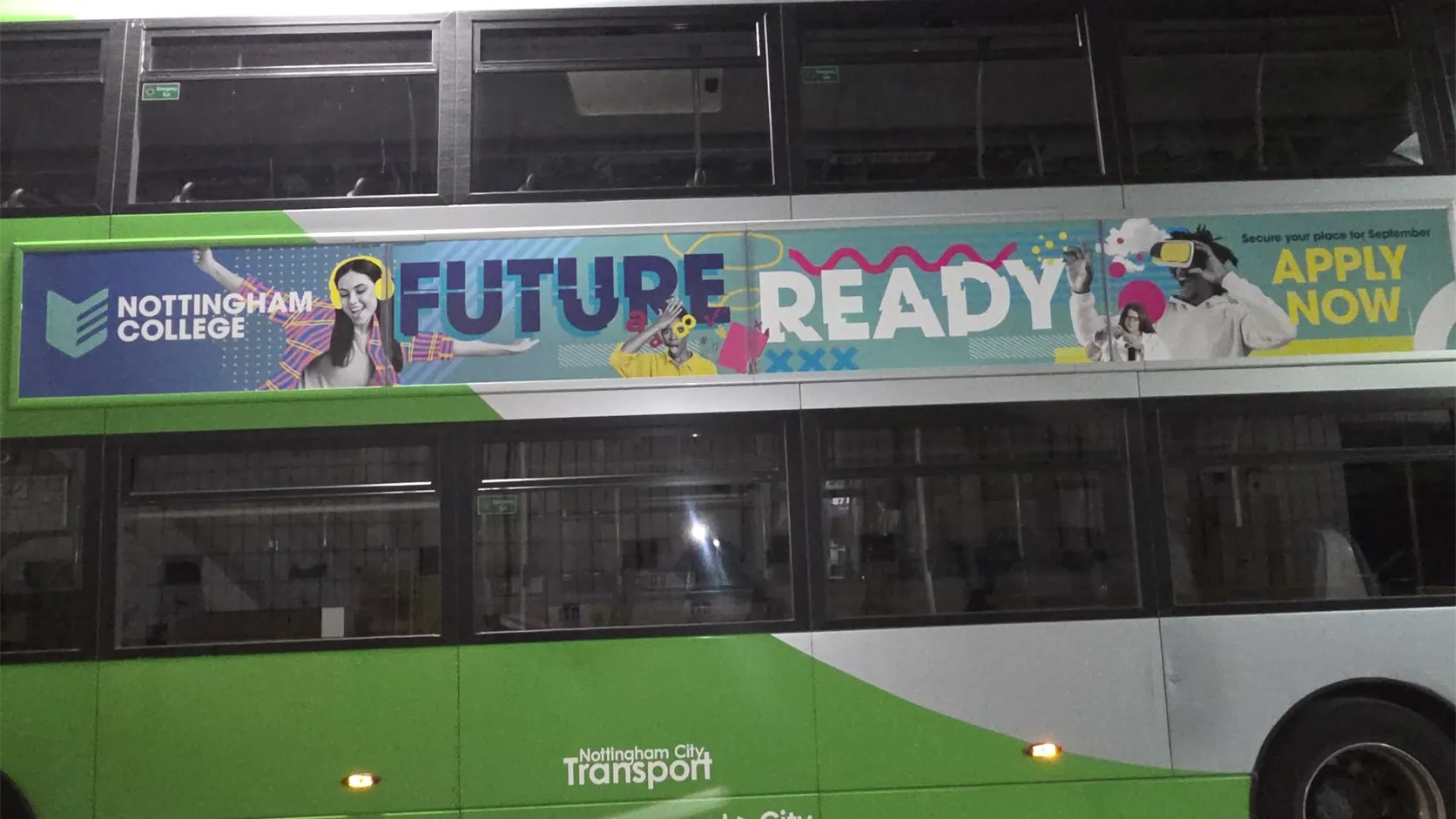 Nottingham College advertising on the side of a Nottingham City Transport bus