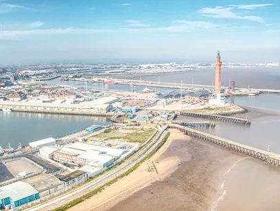 Aerial view of Grimsby docks, pier and the tall Dock Tower on the Humber coast