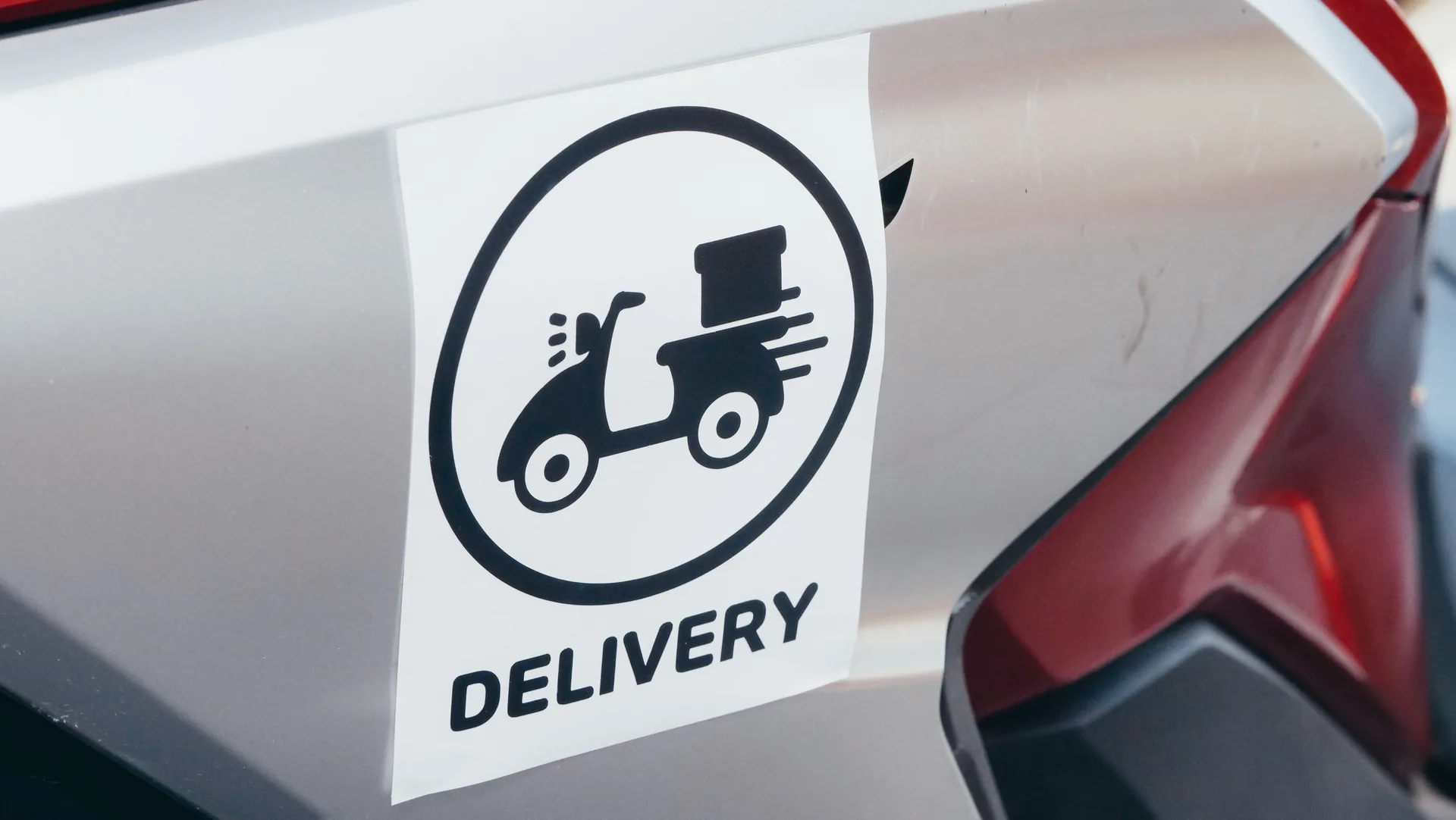 Printed fleet decal applied to a vehicle body panel