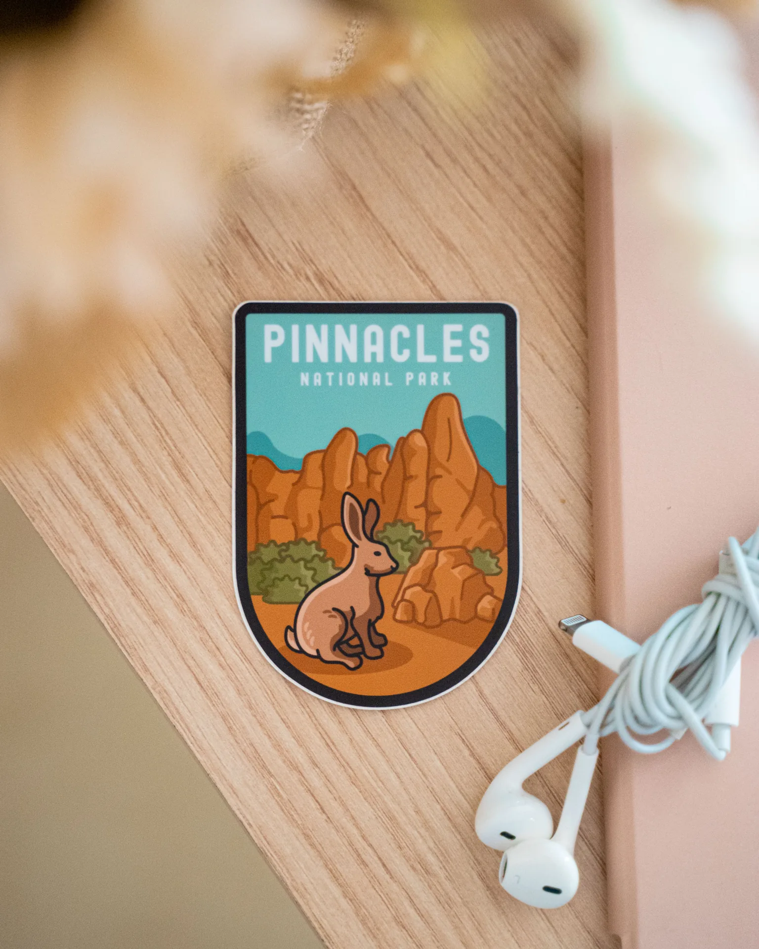 Finished die-cut printed label construction with a laminated surface