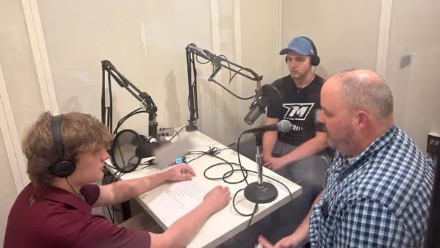 Students recording podcast