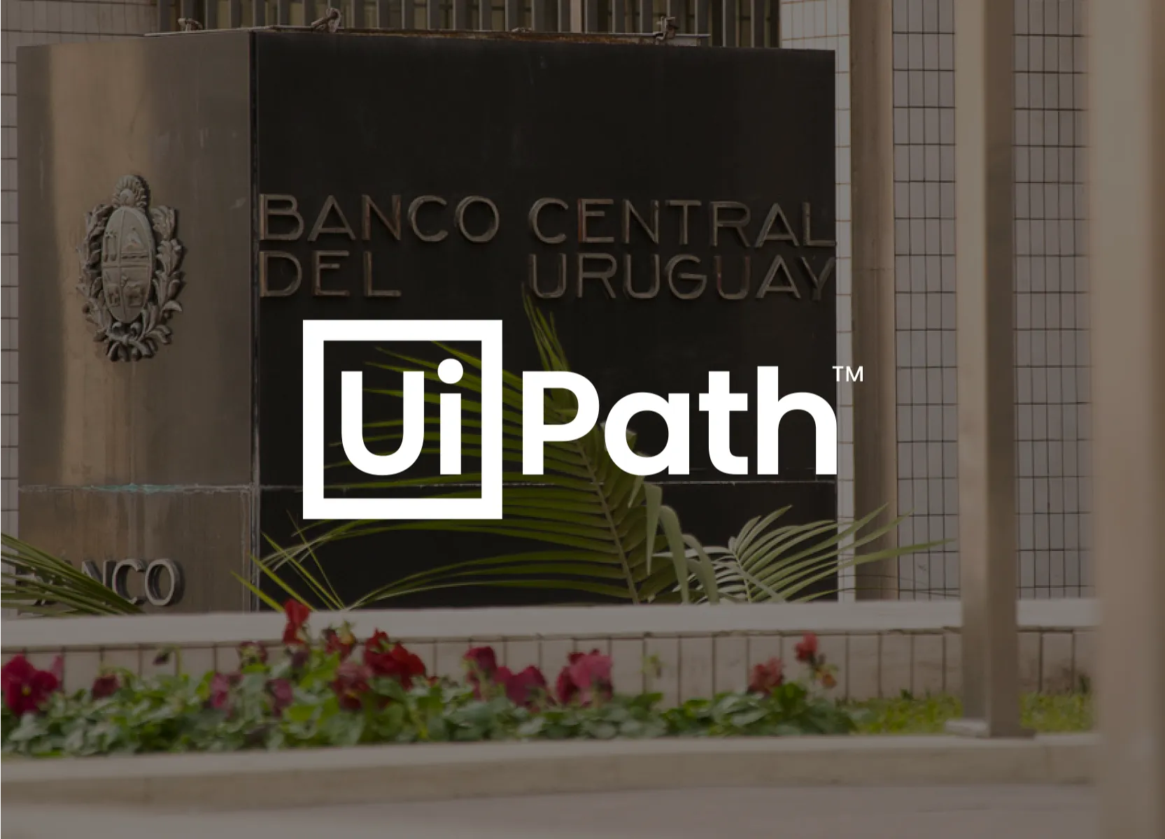 UiPath logo over the Banco Central del Uruguay sign in Montevideo.